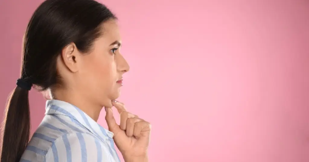 How Many Kybella Treatments Do You Need? 1 Women receiving Kybella Treatment In Kent, WA